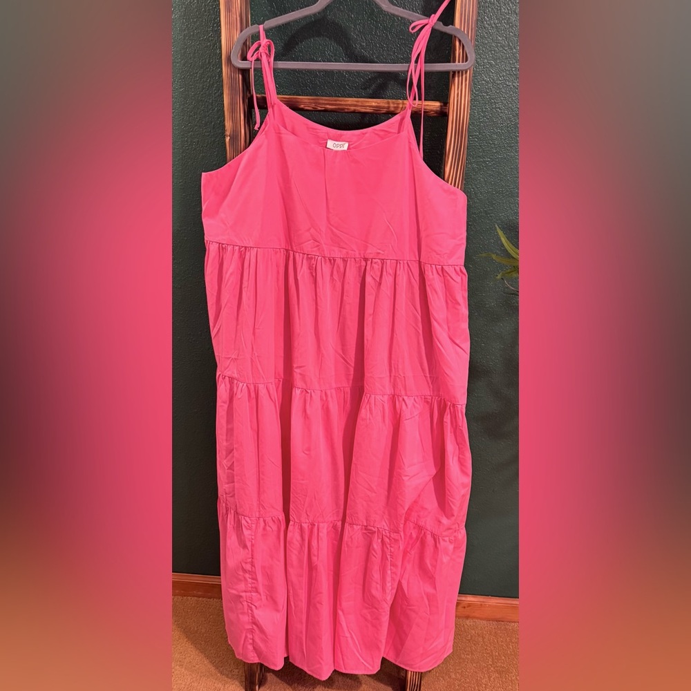 A soft bright pink tank sundress